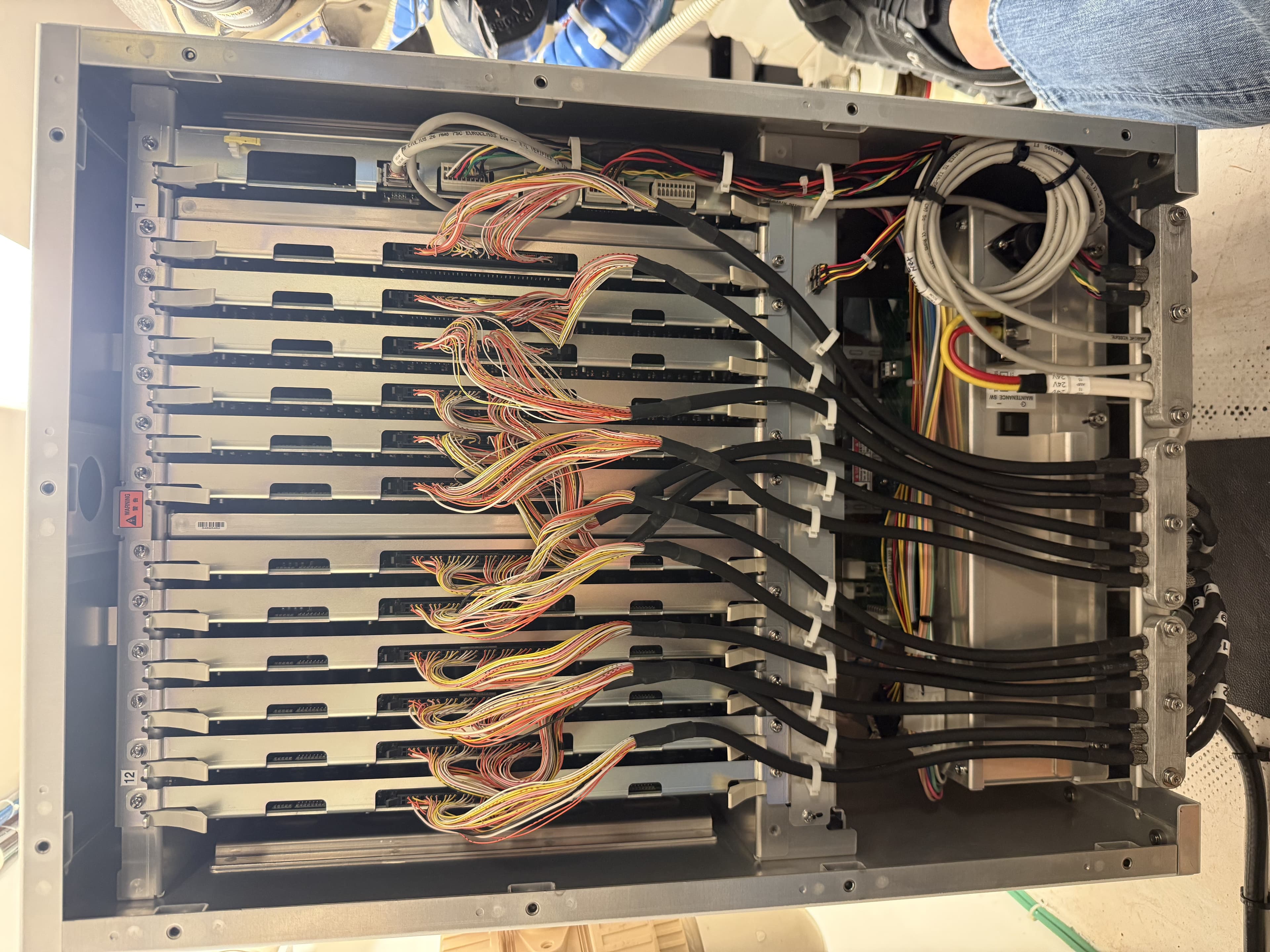 Multi-slot equipment rack with neatly routed and labeled cabling